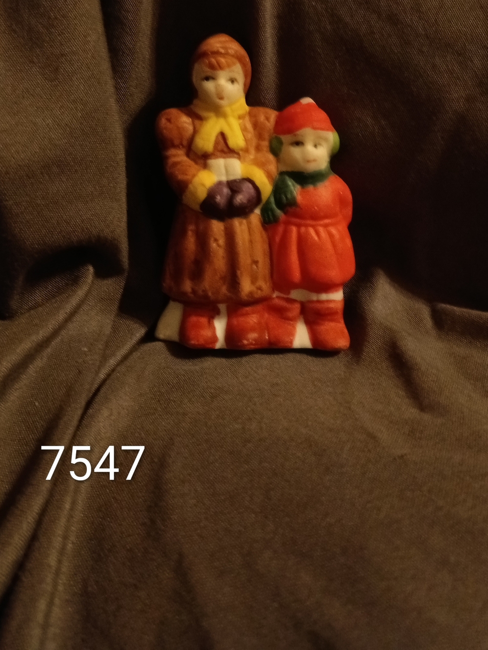 4 Piece Christmas Village Figurines